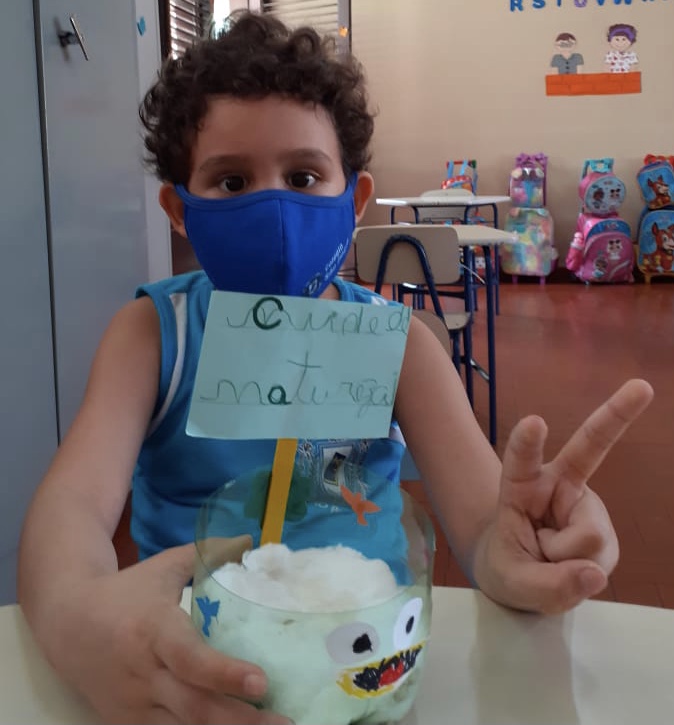 Culminância da Semana do Meio Ambiente - Plantação do grão de feijão (5).jpg