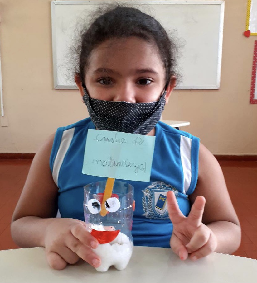 Culminância da Semana do Meio Ambiente - Plantação do grão de feijão (1).jpg